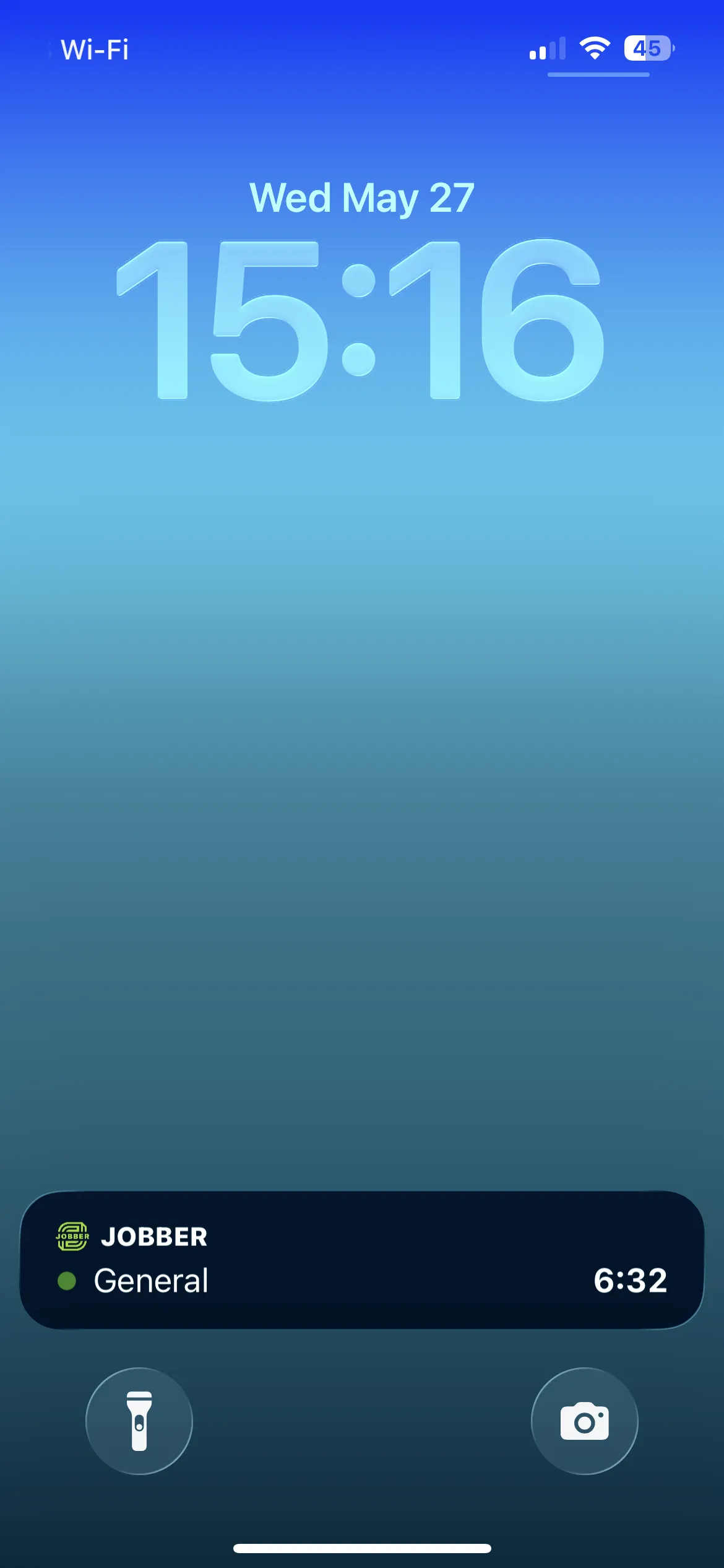 A screenshot of an iPhone lock screen with a Live Activities general timer showing. 