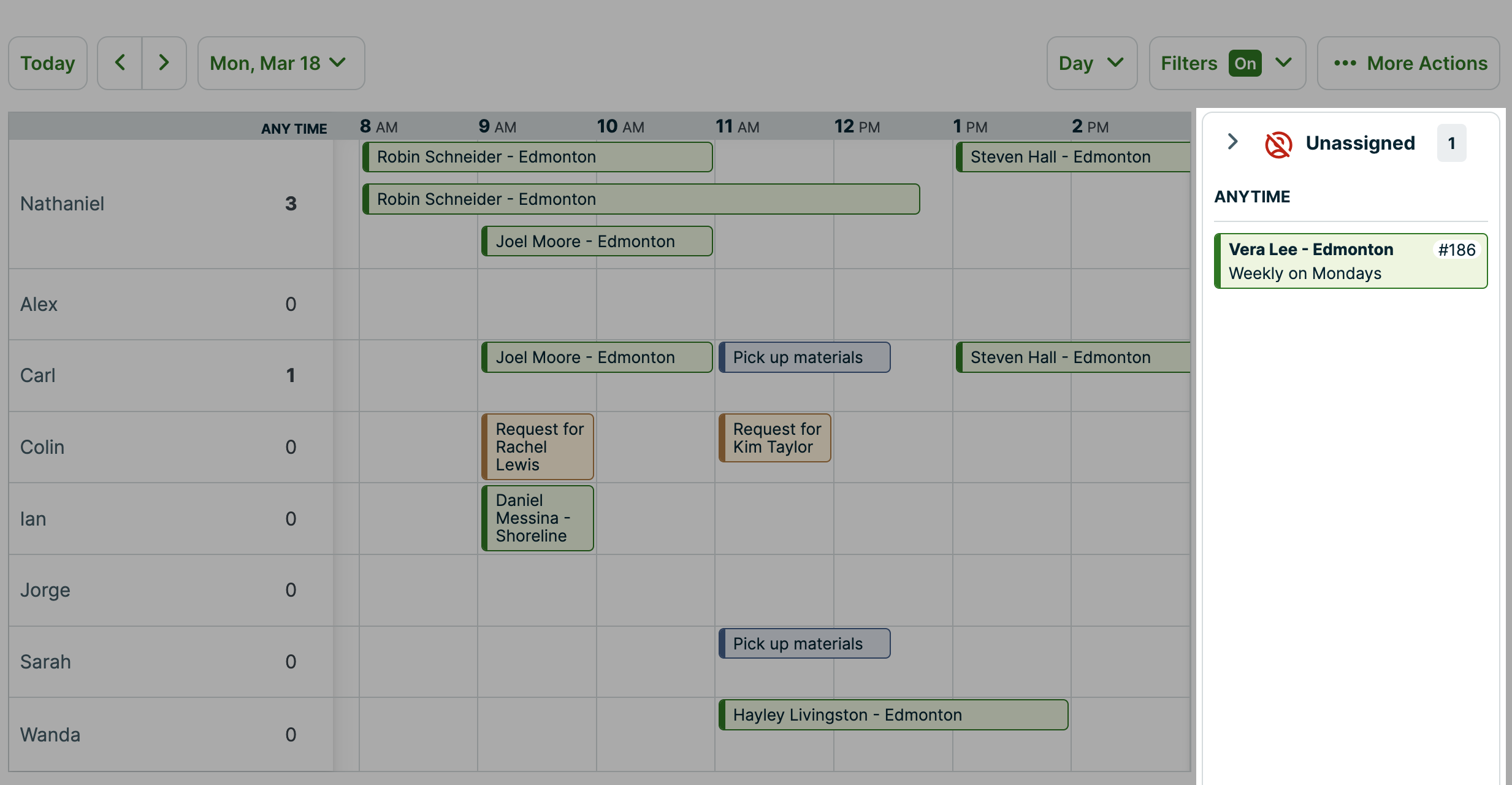 Day view of the schedule with the unassigned drawer open