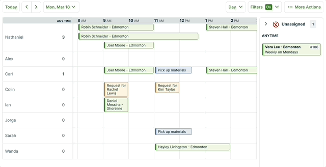 unassigned visit being dragged from the unassigned drawer to a user in order to assign it