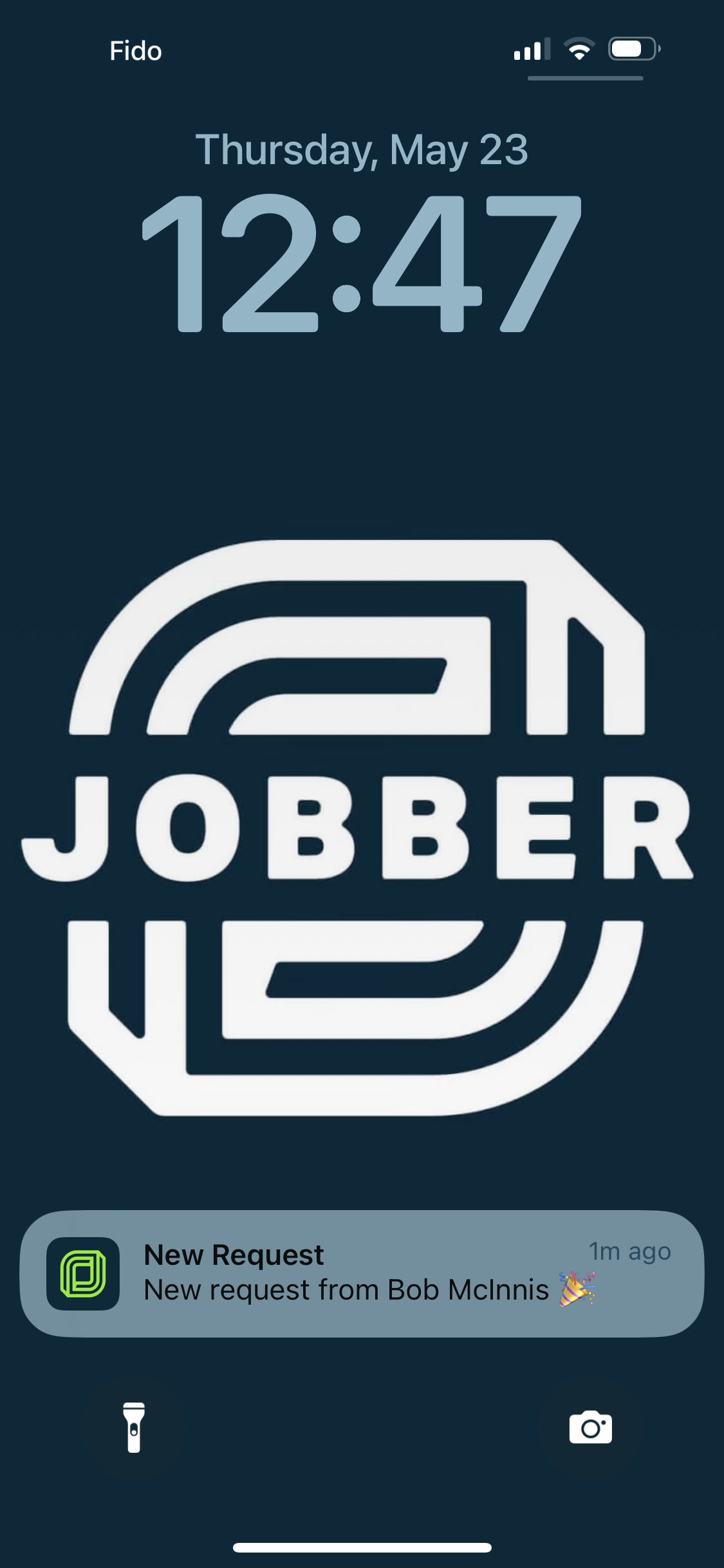 Jobber push notification showing on an iPhone's lock screen
